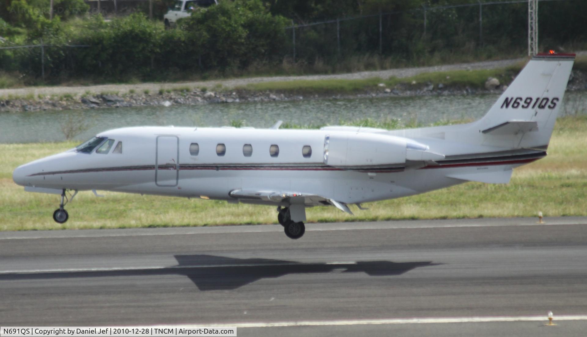 N691QS, 2002 Cessna 560XL C/N 560-5290, N691QS landing at TNCM