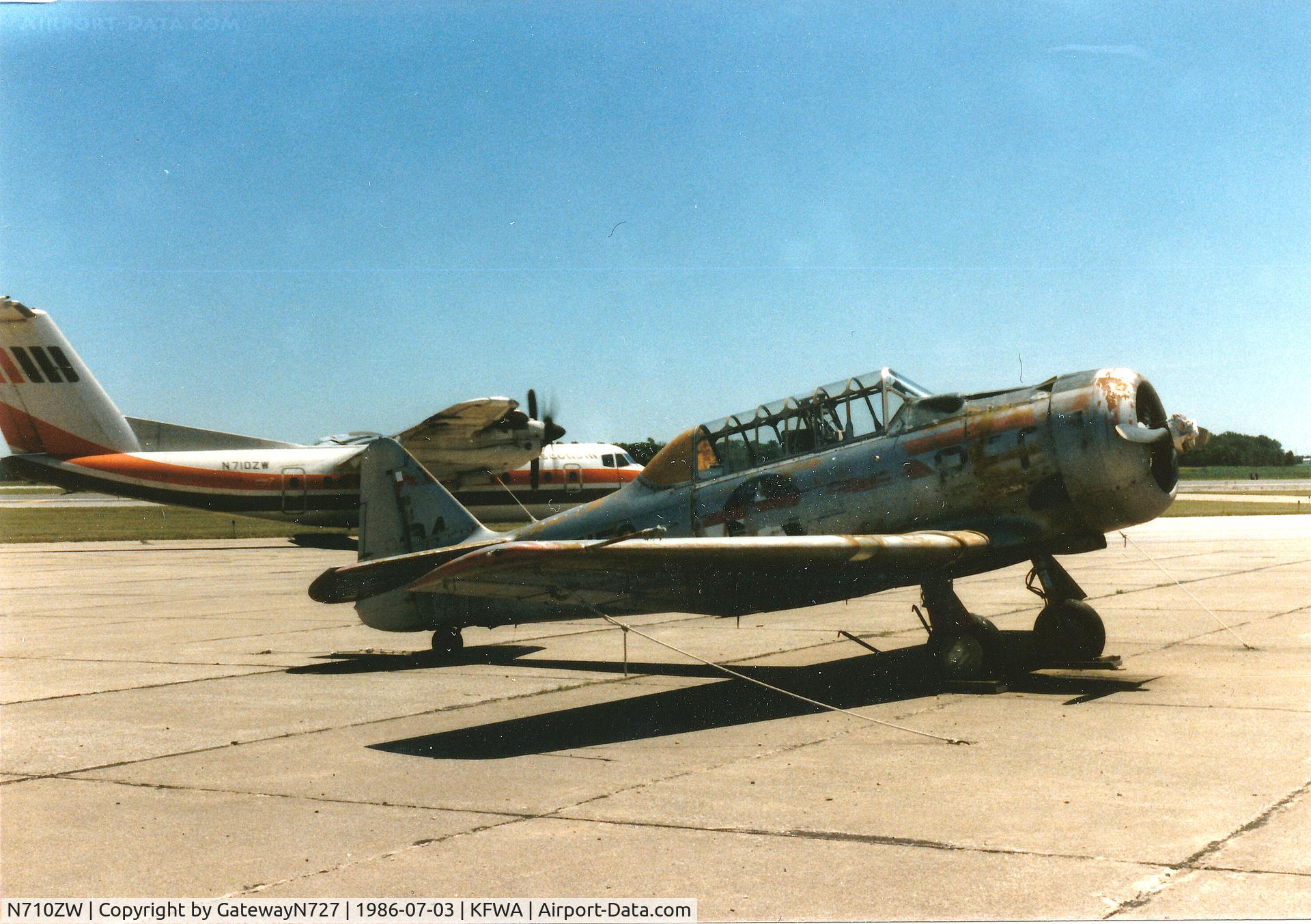 N710ZW, 1981 De Havilland Canada DHC-7-102 Dash 7 C/N 70, Partial shot behind N6515C.