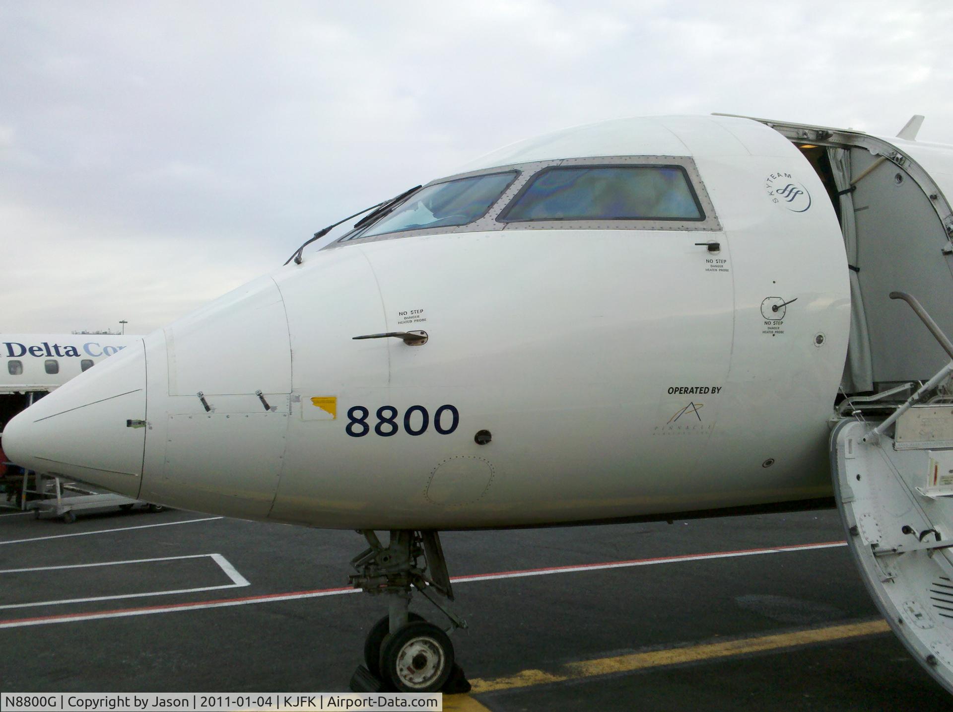 N8800G, 2003 Canadair CRJ-440 (CL-600-2B19) Regional Jet C/N 7800, At Terminal 2 gate 23C JFK 1/4/2011 10am