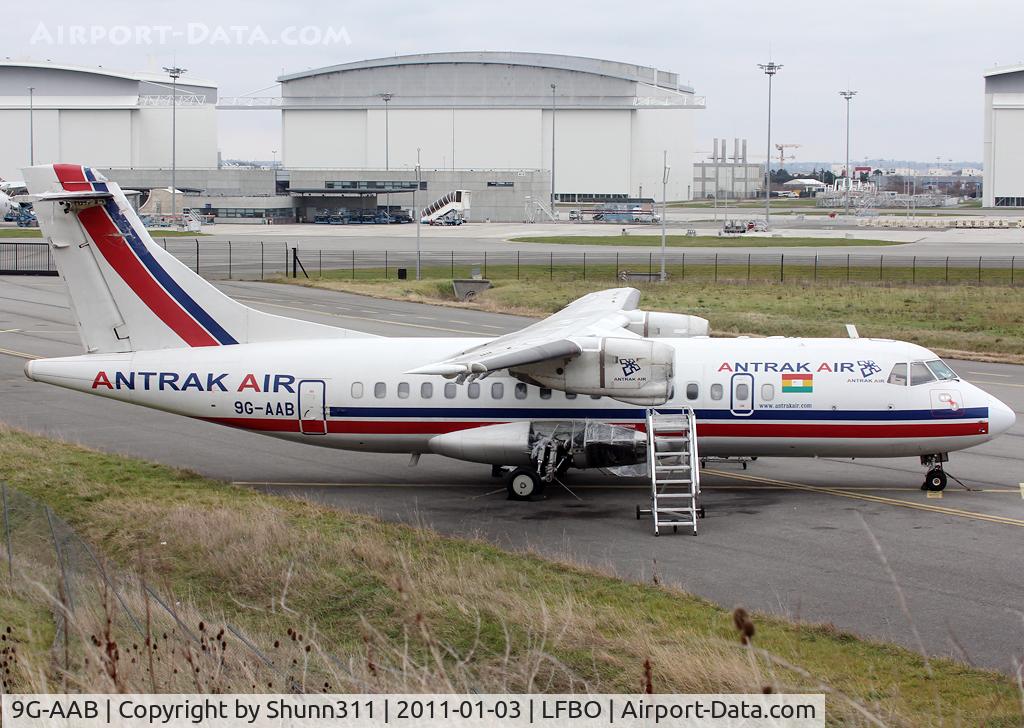 9G-AAB, 1987 ATR 42-300 C/N 041, On heavy maintenance... additional flag added on the fuselage...