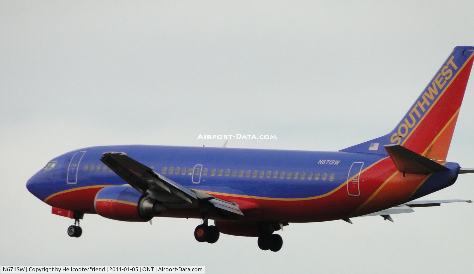 N671SW, 1988 Boeing 737-3G7 C/N 23785, On final over the outer fence or runway 26L