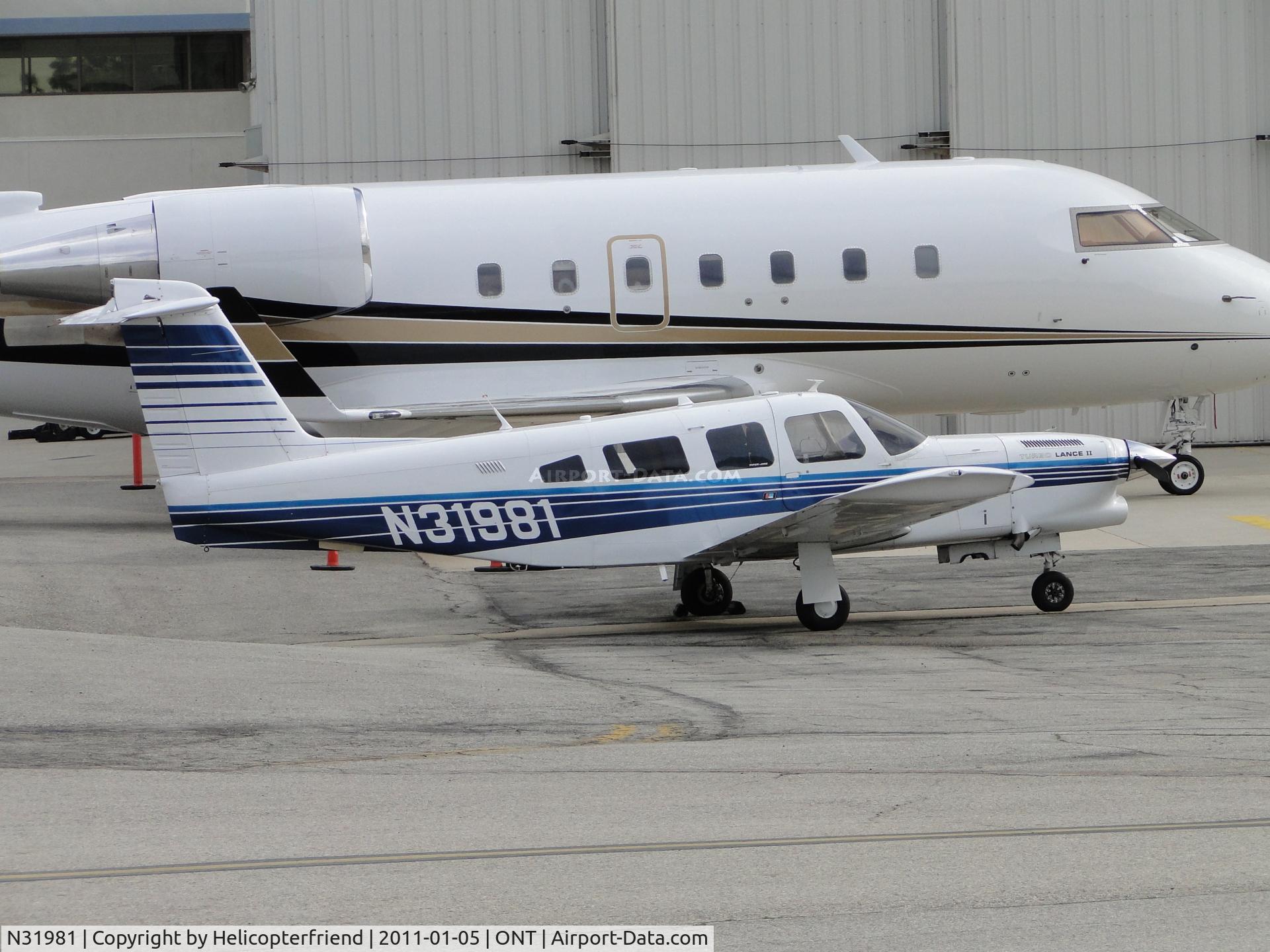 N31981, 1978 Piper PA-32RT-300T Turbo Lance II C/N 32R-7887018, Parked on the southside by the business jets
