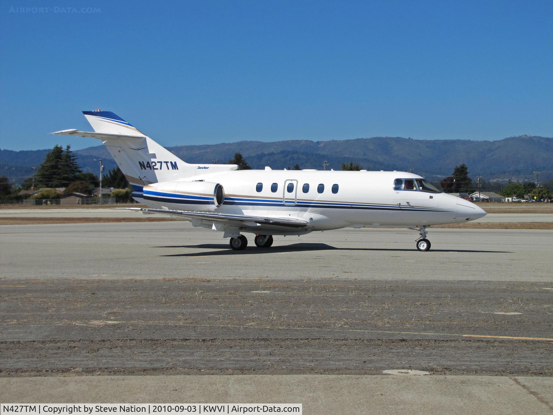 N427TM, 2005 Raytheon Hawker 800XP C/N 258720, Aircraft Holdings Raytheon Hawker 800XP turning on to ramp at WVI during 2010 Watsonville Fly-In