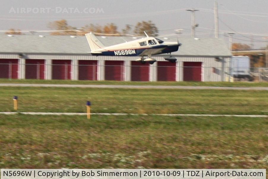 N5696W, 1963 Piper PA-28-150 Cherokee C/N 28-1072, Arriving at the EAA breakfast fly-in at Toledo, Ohio
