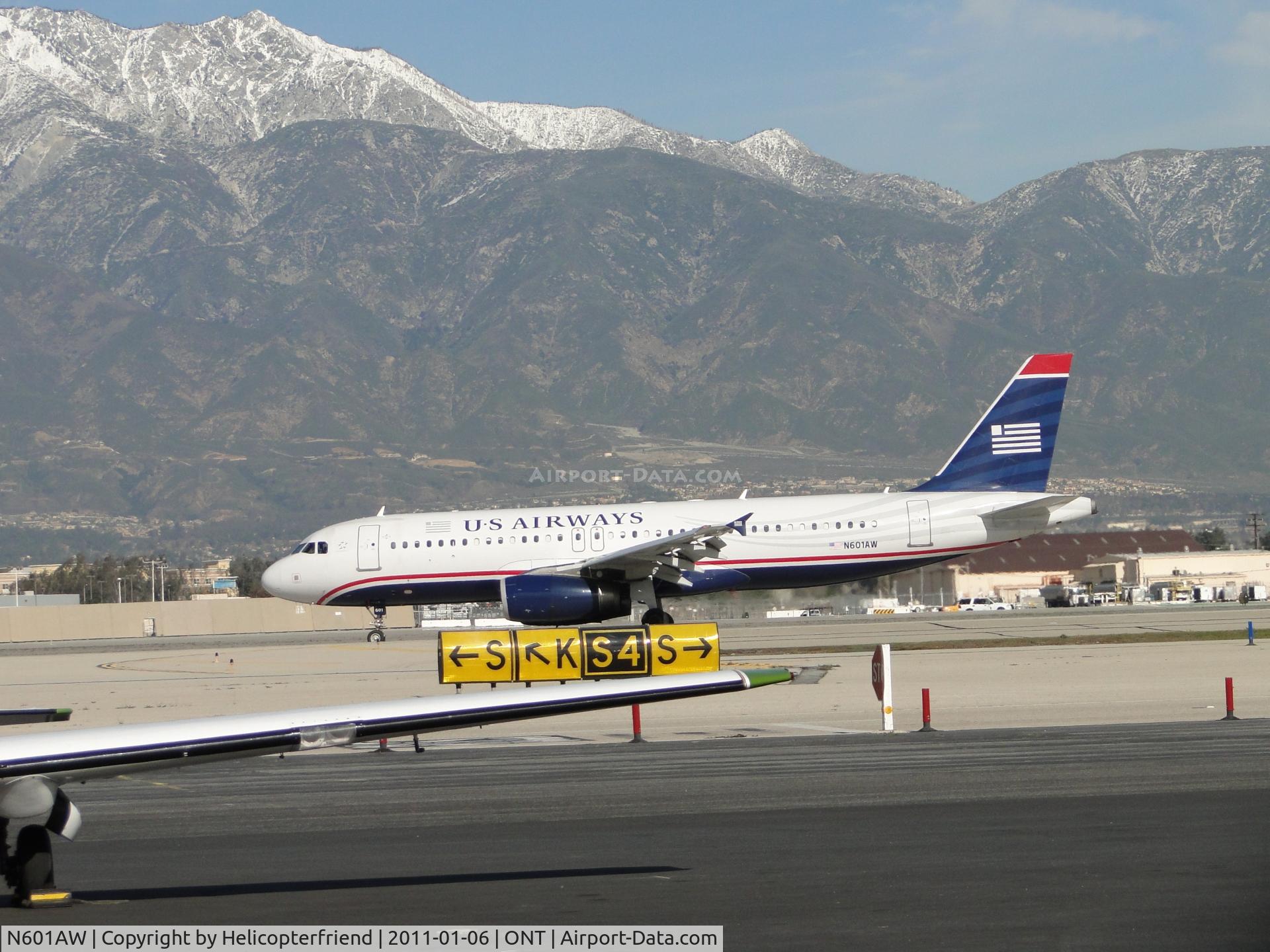 N601AW, 2003 Airbus A320-232 C/N 1935, After reversing the engines and slowing down, ship enters taxiway 