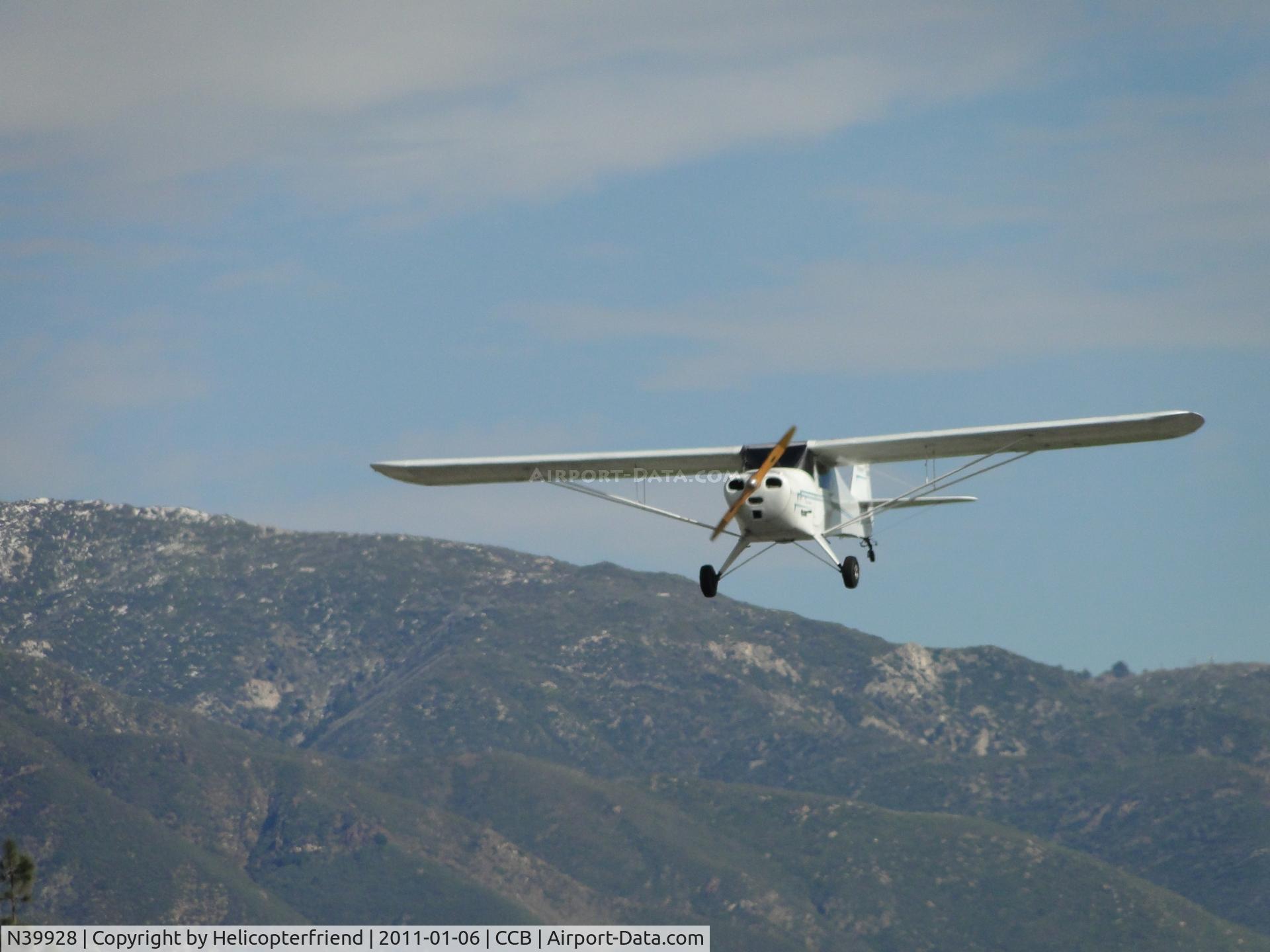 N39928, 1945 Taylorcraft BC12-D C/N 6581, Crossing Benson St and outer fence for landing