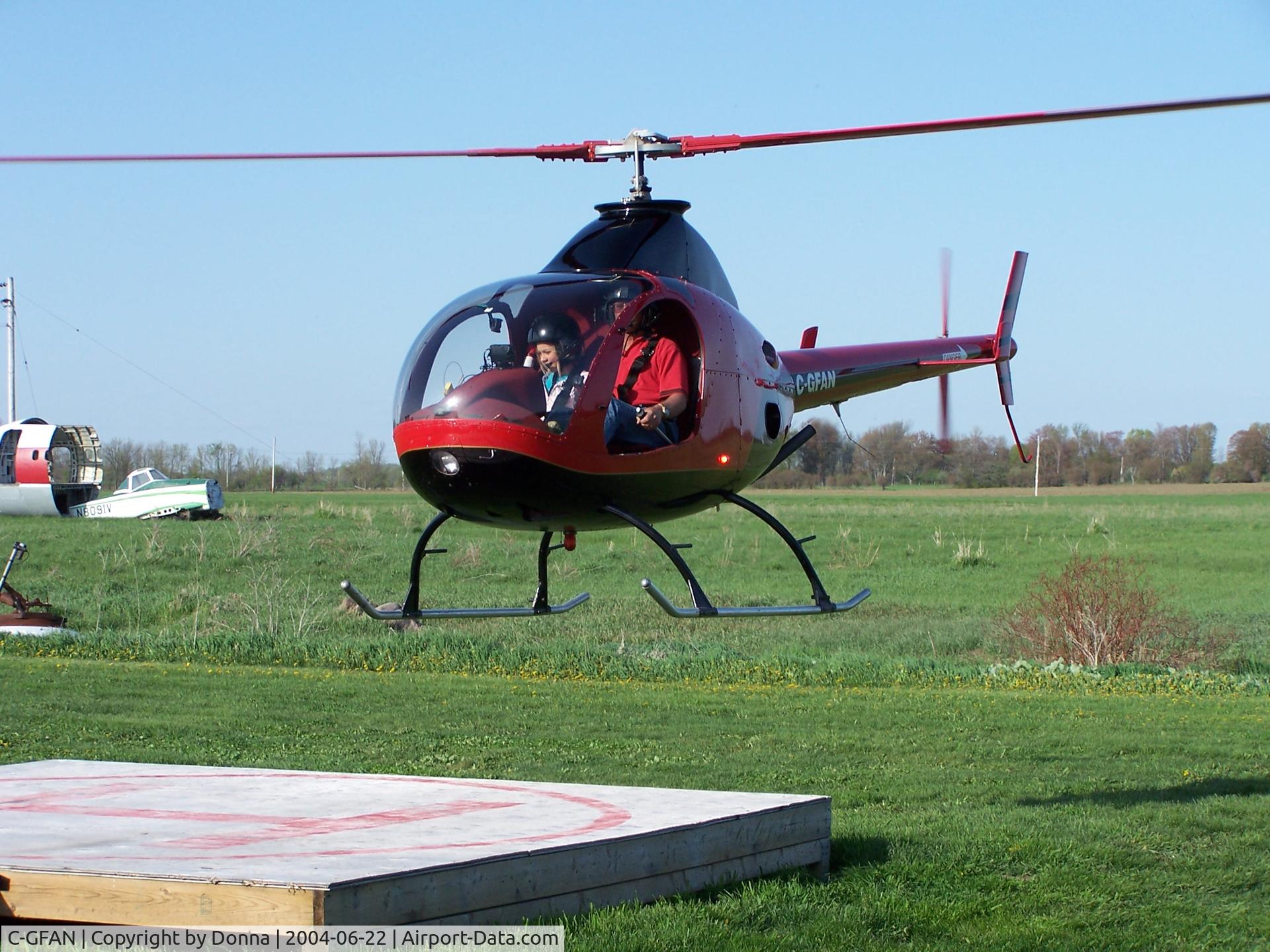 C-GFAN, 2000 Rotorway Exec 162F C/N 6130, C-GFAN landing on it's pad in Brechin, Ontario