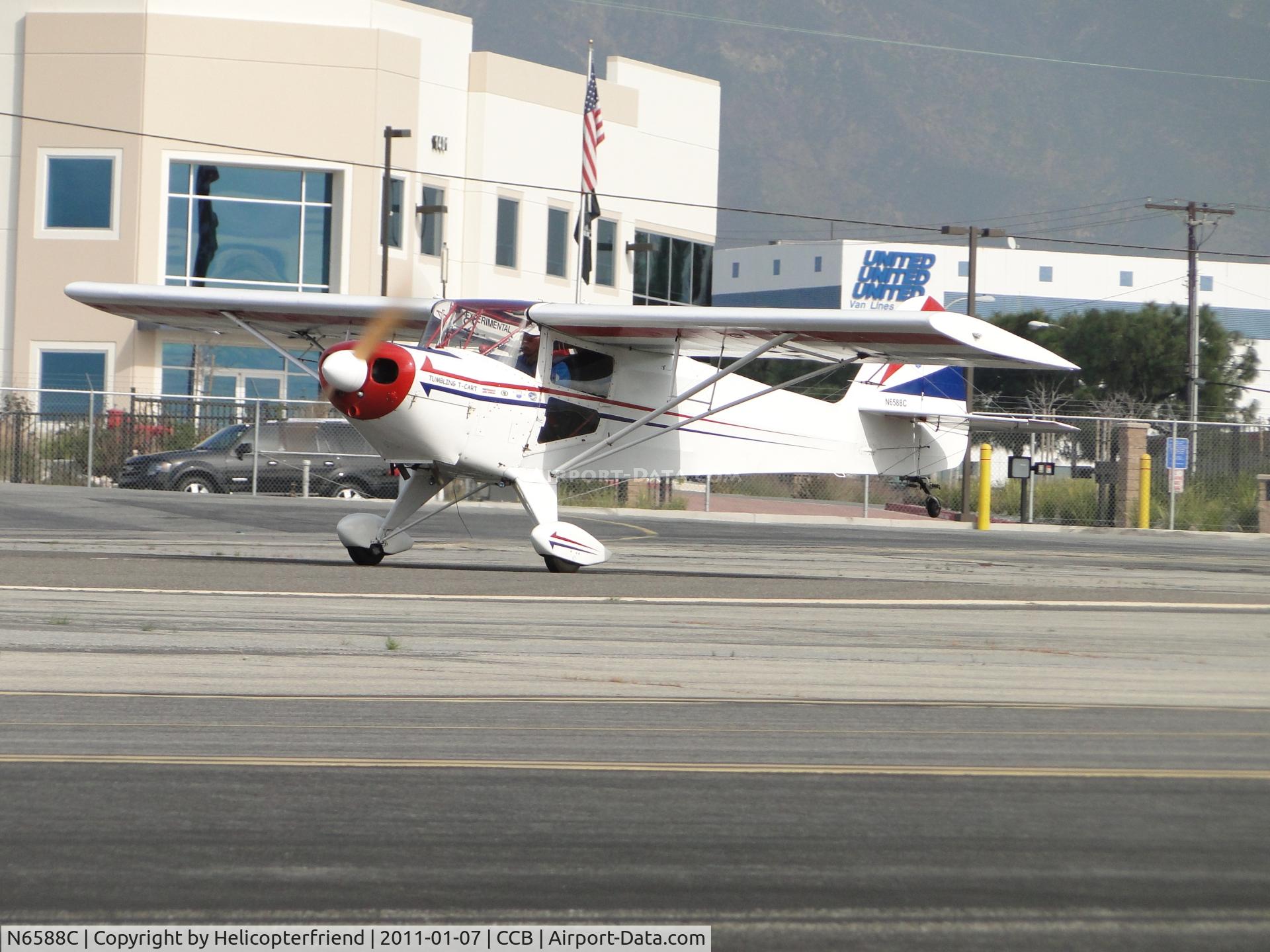 N6588C, 1992 Taylorcraft/Swick T-Clips C/N 1, Tail wheel up and taking off westbound from runway 24