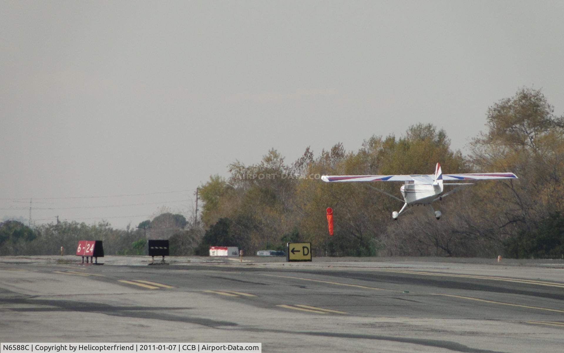 N6588C, 1992 Taylorcraft/Swick T-Clips C/N 1, Long, low take off heading westbound until near the end of the runway then almost straight up she went