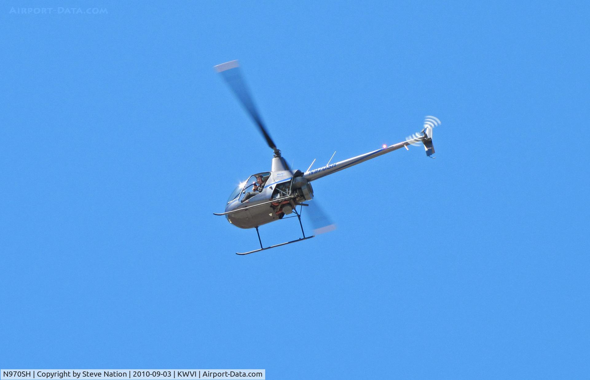 N970SH, 2005 Robinson R22 Beta C/N 3950, Parker Helicopters (Capitola, CA) 2005 Robbie R22 BETA over the crowd at 2010 Watsonville Fly-In