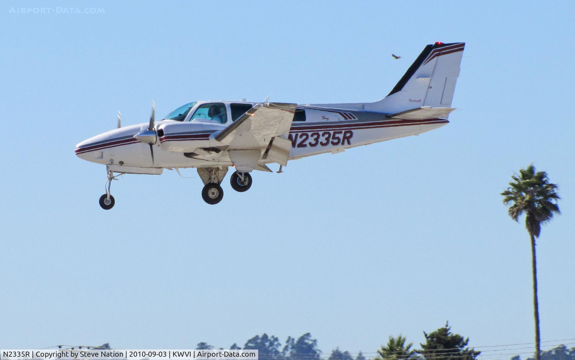 N2335R, 1997 Raytheon Aircraft Company 58 C/N TH-1835, Propellerhead Aviation (Santa Cruz, CA) 1997 Raytheon 58 on final @ 2010 Watsonville Fly-in