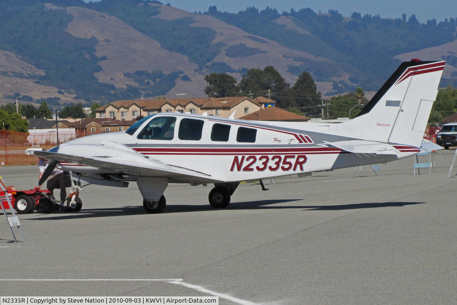 N2335R, 1997 Raytheon Aircraft Company 58 C/N TH-1835, Propellerhead Aviation (Santa Cruz, CA) 1997 Raytheon 58 parking @ 2010 Watsonville Fly-in