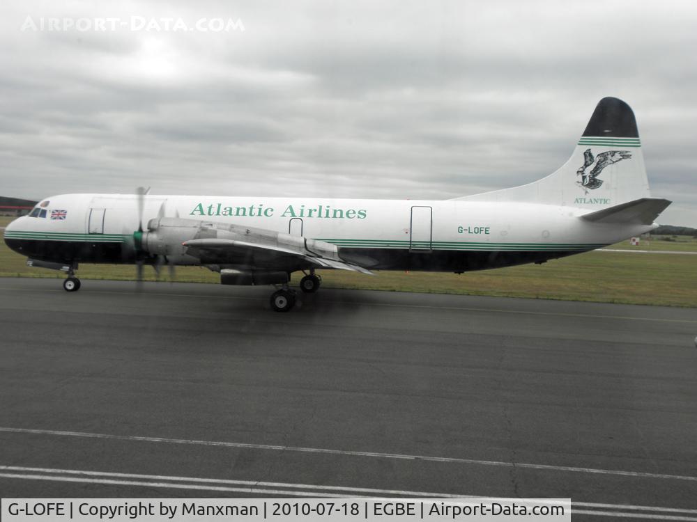 G-LOFE, 1966 Lockheed L-188C(A) Electra C/N 1144, Electras are Fantastic Aircraft, taken through the window of DC-6 G-APSA