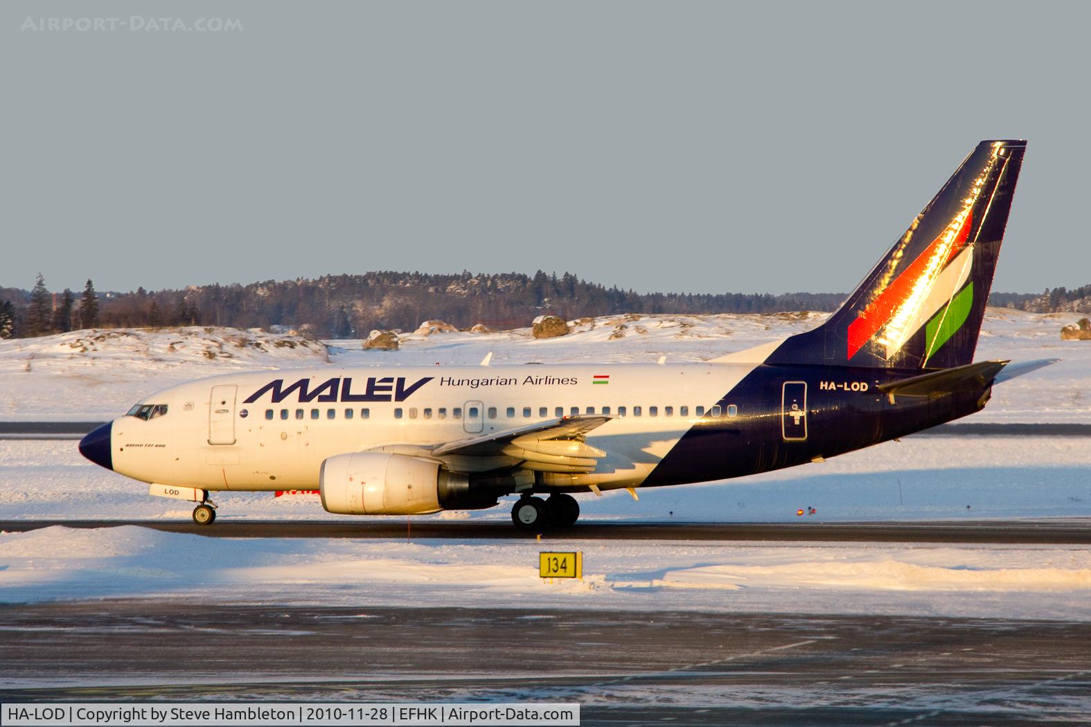HA-LOD, 2003 Boeing 737-6Q8 C/N 28259, Taken in the early morning light from inside Terminal 2