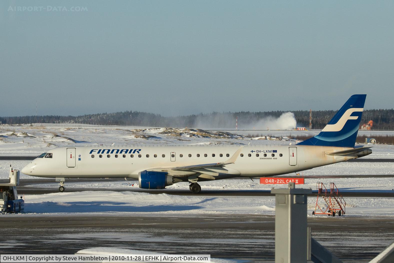 OH-LKM, 2008 Embraer 190LR (ERJ-190-100LR) C/N 19000160, Taken from inside Terminal 2. Note the snow blowing in the background