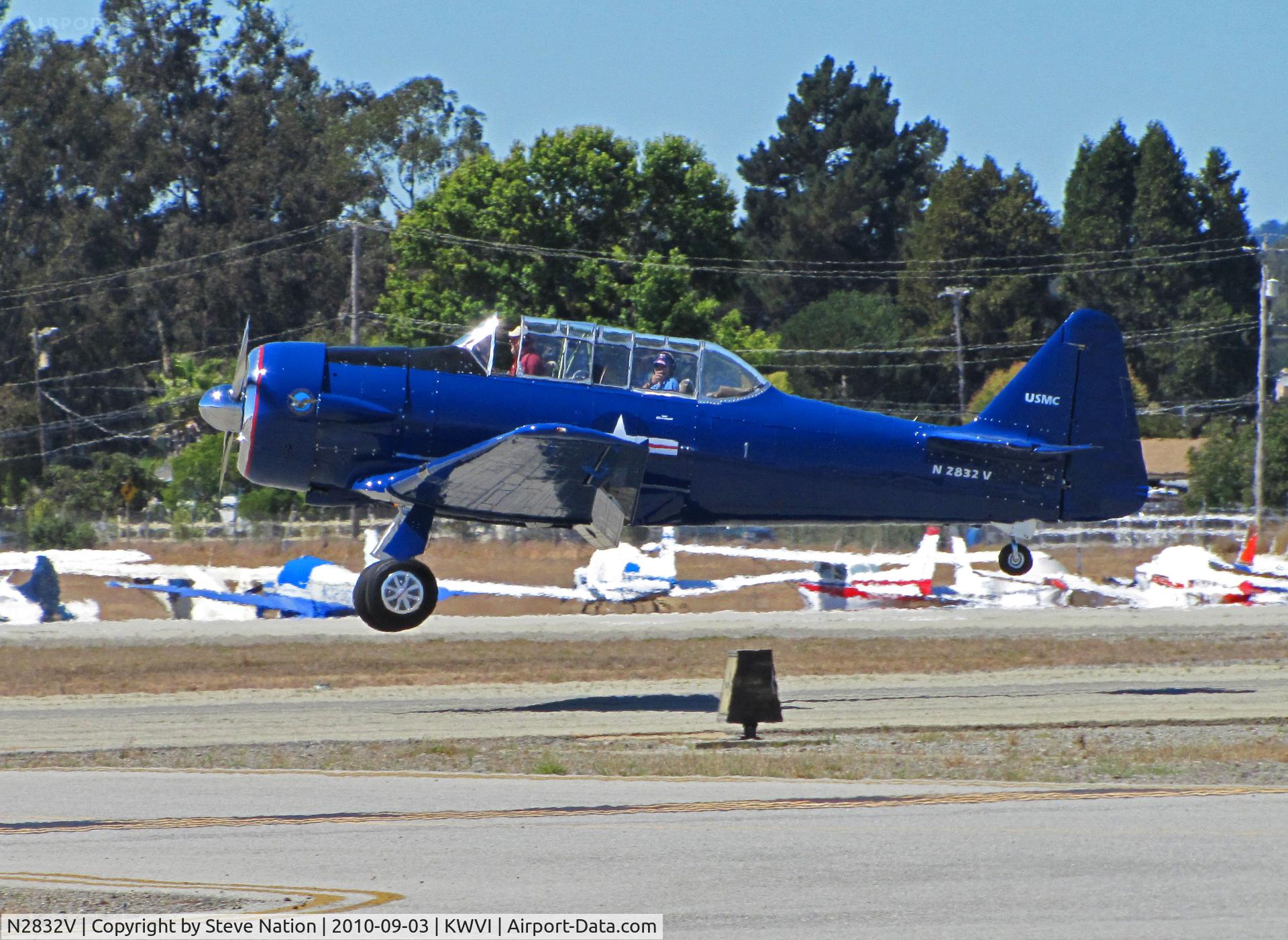 N2832V, North American AT-6G Texan C/N 168-485 (49-3371), North American AT-6G in dark blue colors with USMC titles (no nose art on port side) landing @ 2010 Watsonville Fly-In