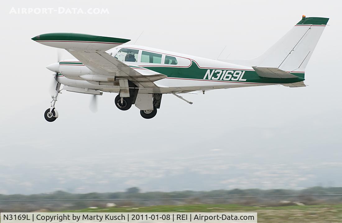 N3169L, 1965 Cessna 310J C/N 310J0169, Departing Runway 26.