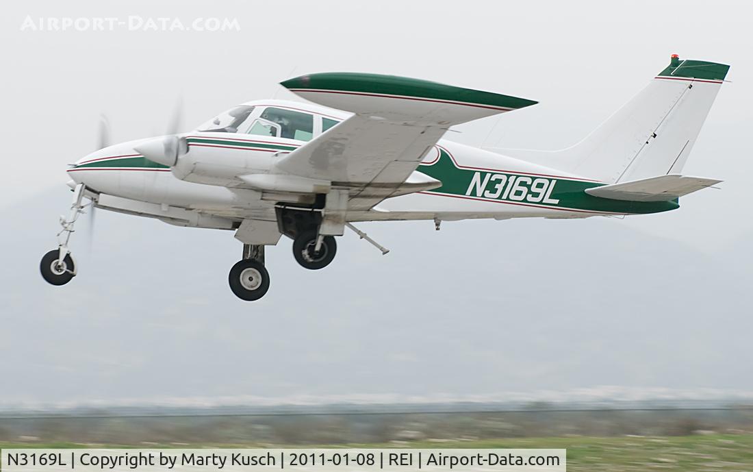 N3169L, 1965 Cessna 310J C/N 310J0169, Departing Runway 26.