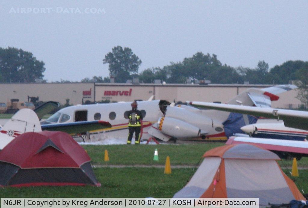 N6JR, 2007 Raytheon Aircraft Company 390 C/N RB-161, EAA AirVenture 2010. I didn't see the crash, but I found the aftermath about 20 minutes later complete with a huge group of people gathered around.
