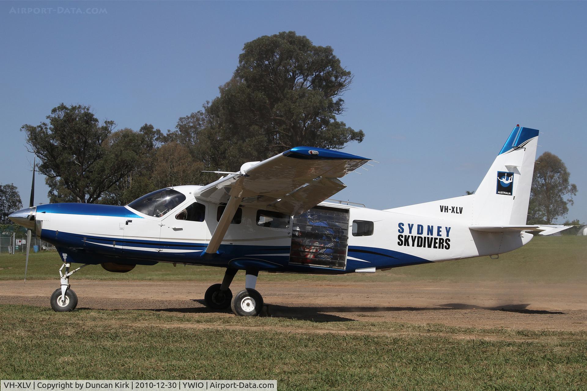 VH-XLV, Cessna 208 Caravan 1 C/N 20800053, Crammed in like sardines this Sydney Skydivers Caravan is about to launch from the dirt strip.