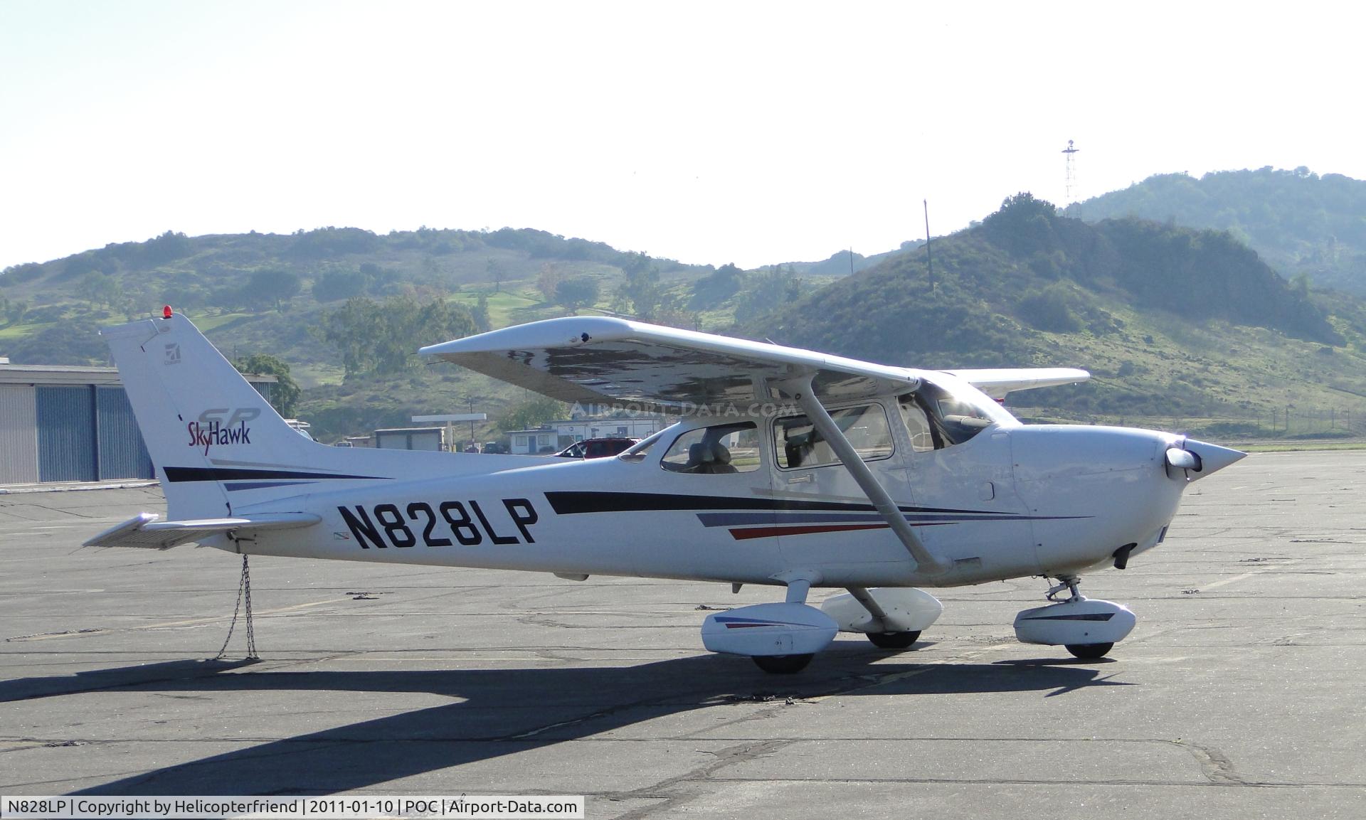 N828LP, 2001 Cessna 172S C/N 172S8828, Parked in Ballard Aviation parking area