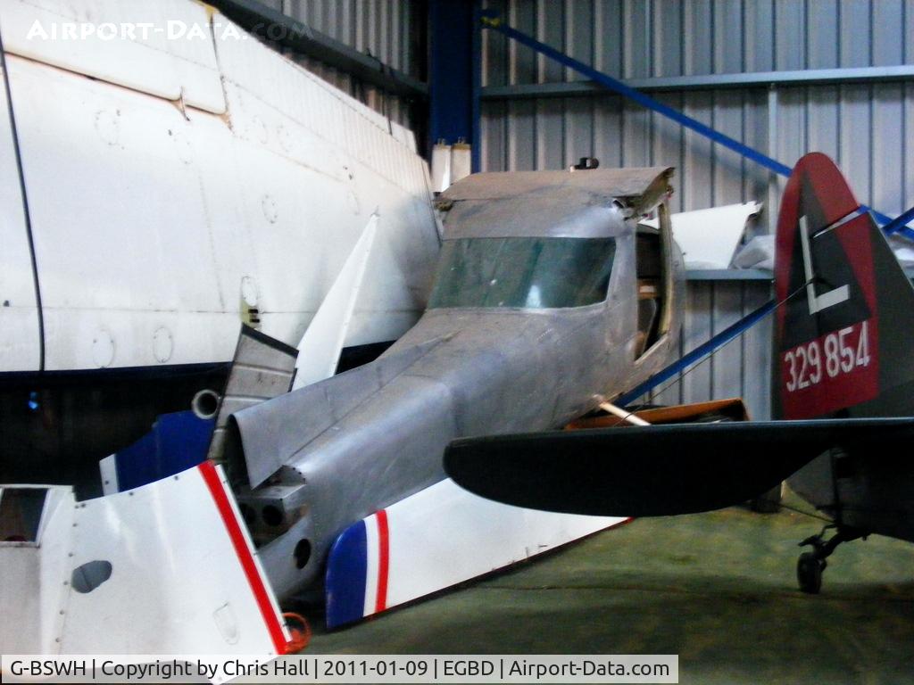 G-BSWH, 1978 Cessna 152 C/N 152-81365, stored in the corner of the main hangar