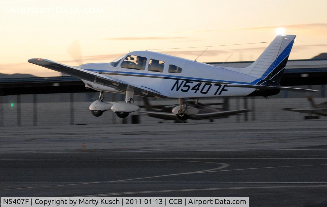 N5407F, 1977 Piper PA-28-181 Archer II C/N 28-7790112, Sunset departure from Runway 24.