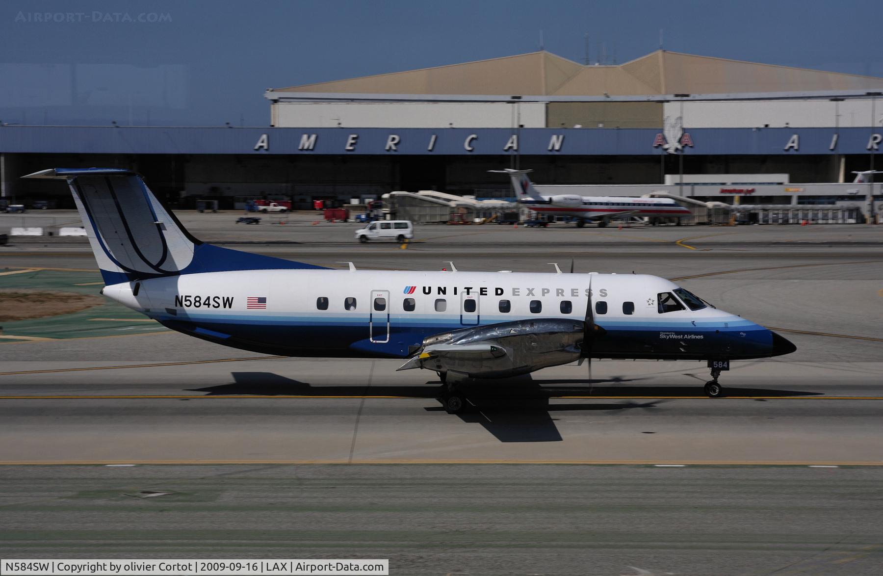 N584SW, 1999 Embraer EMB-120ER Brasilia C/N 120352, Lax 2009