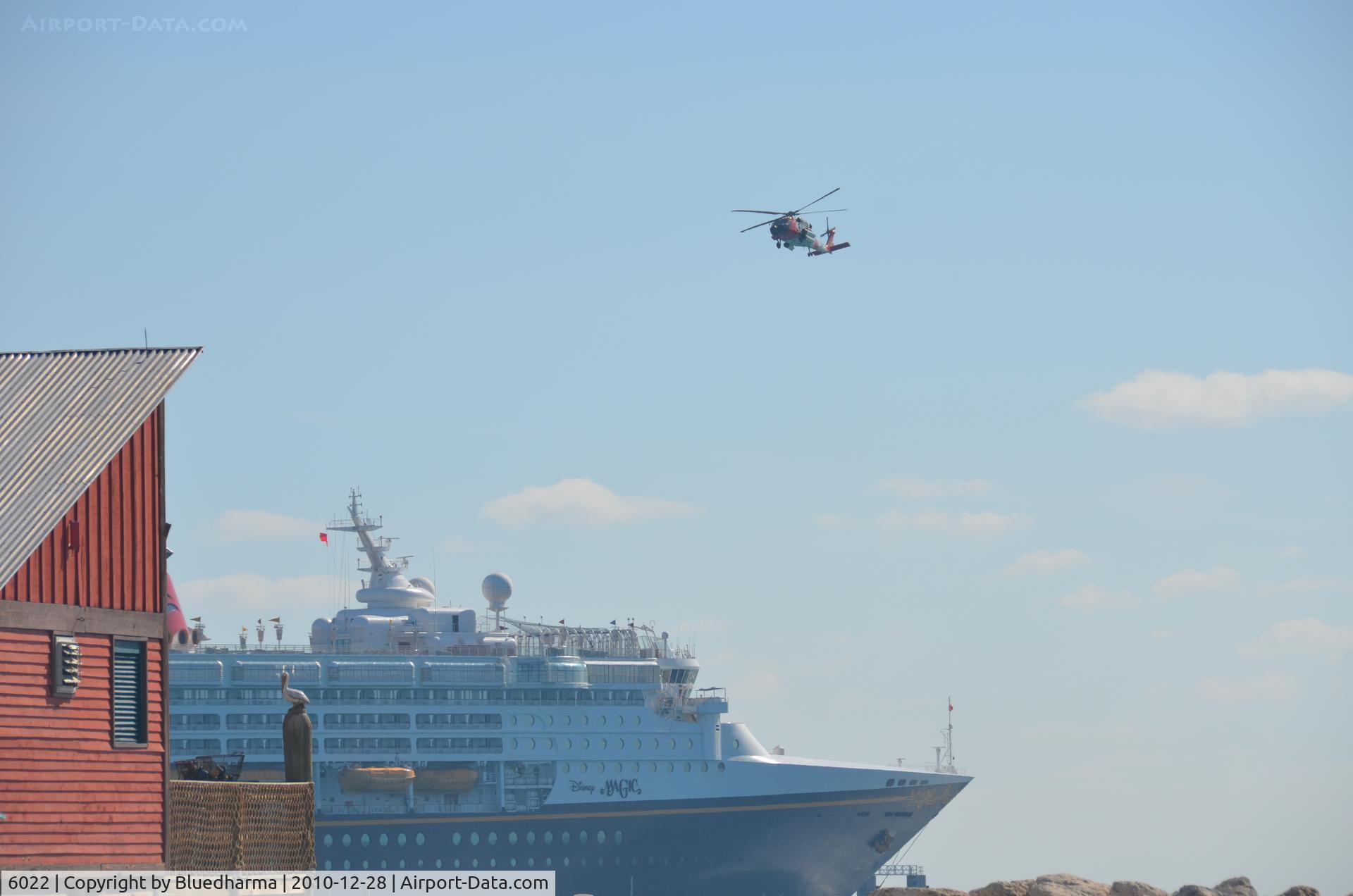 6022, Sikorsky HH-60J Jayhawk C/N 70.1705, Coast Guard Helicopter at Castaway Cay in the Bahamas flying around the Disney Magic Cruise Ship.
