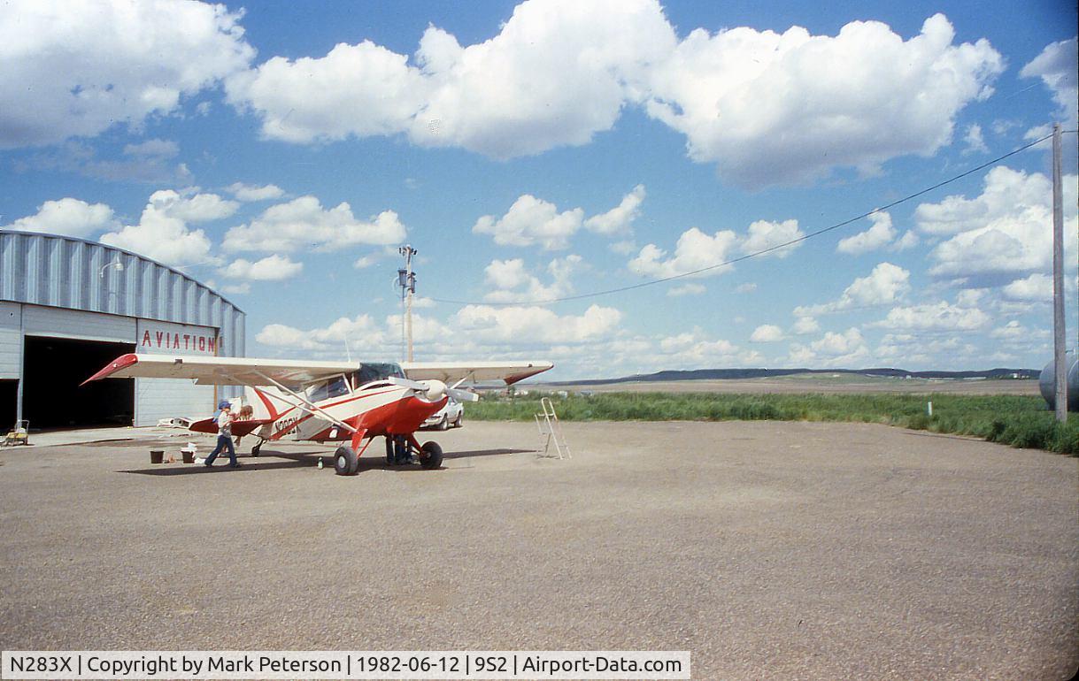 N283X, 1975 Maule M-5-210C Strata Rocket C/N 6102C, Washing the Maule at Daniels Co Airport