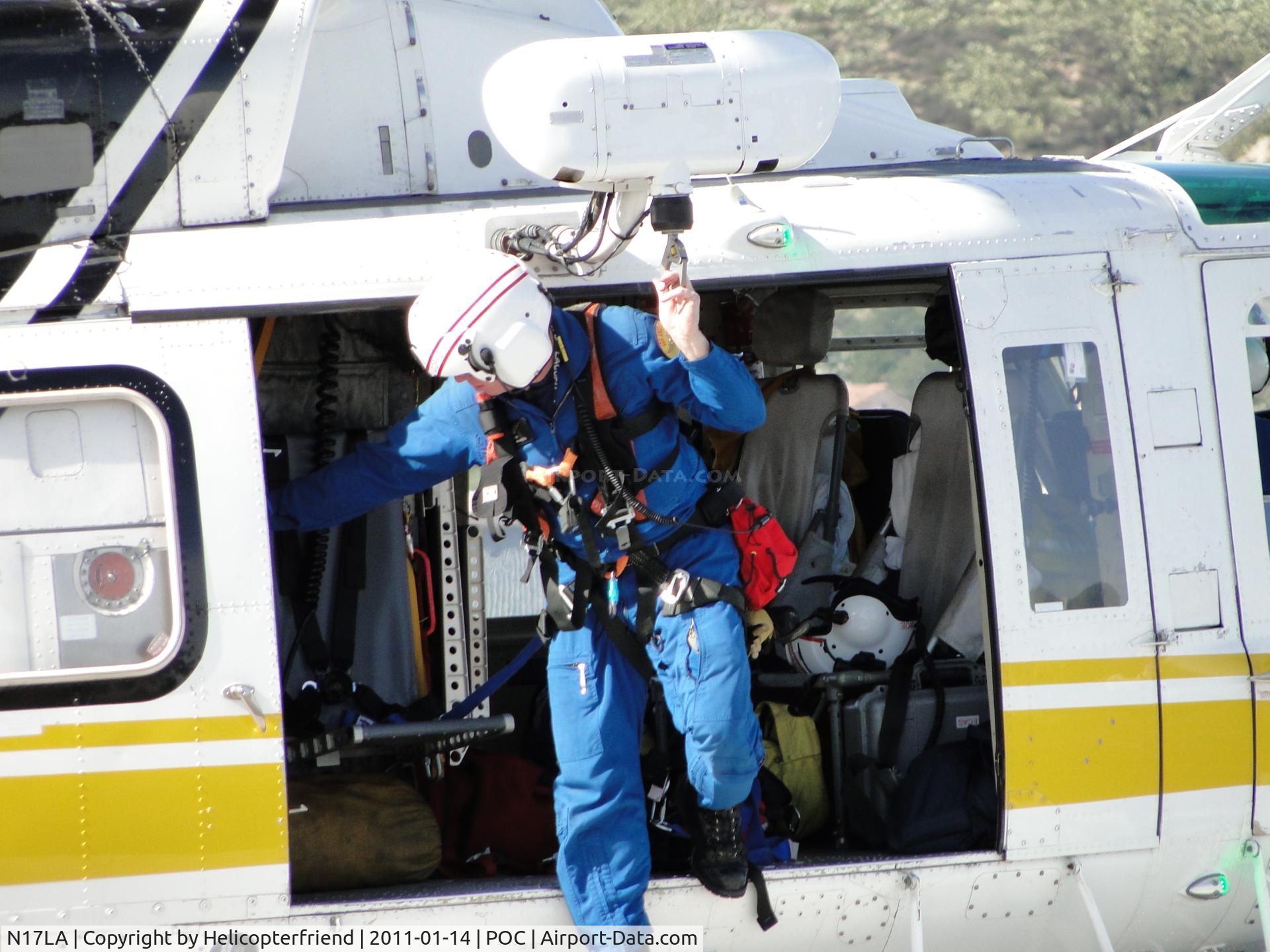 N17LA, 1992 Bell 412 C/N 36044, Crew member who was involved in a successful hoisting operation, getting out of the ship.