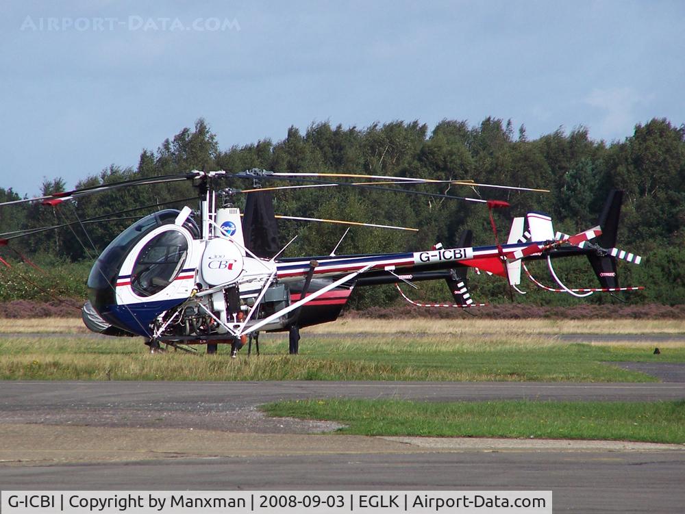 G-ICBI, 2007 Schweizer 269C-1 C/N 0272, Schweizer next to R22 and R44s