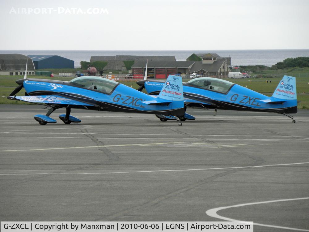 G-ZXCL, 2006 Extra EA-300L C/N 1223, G-ZXEL behind. The Blades took part in displays during TT Week