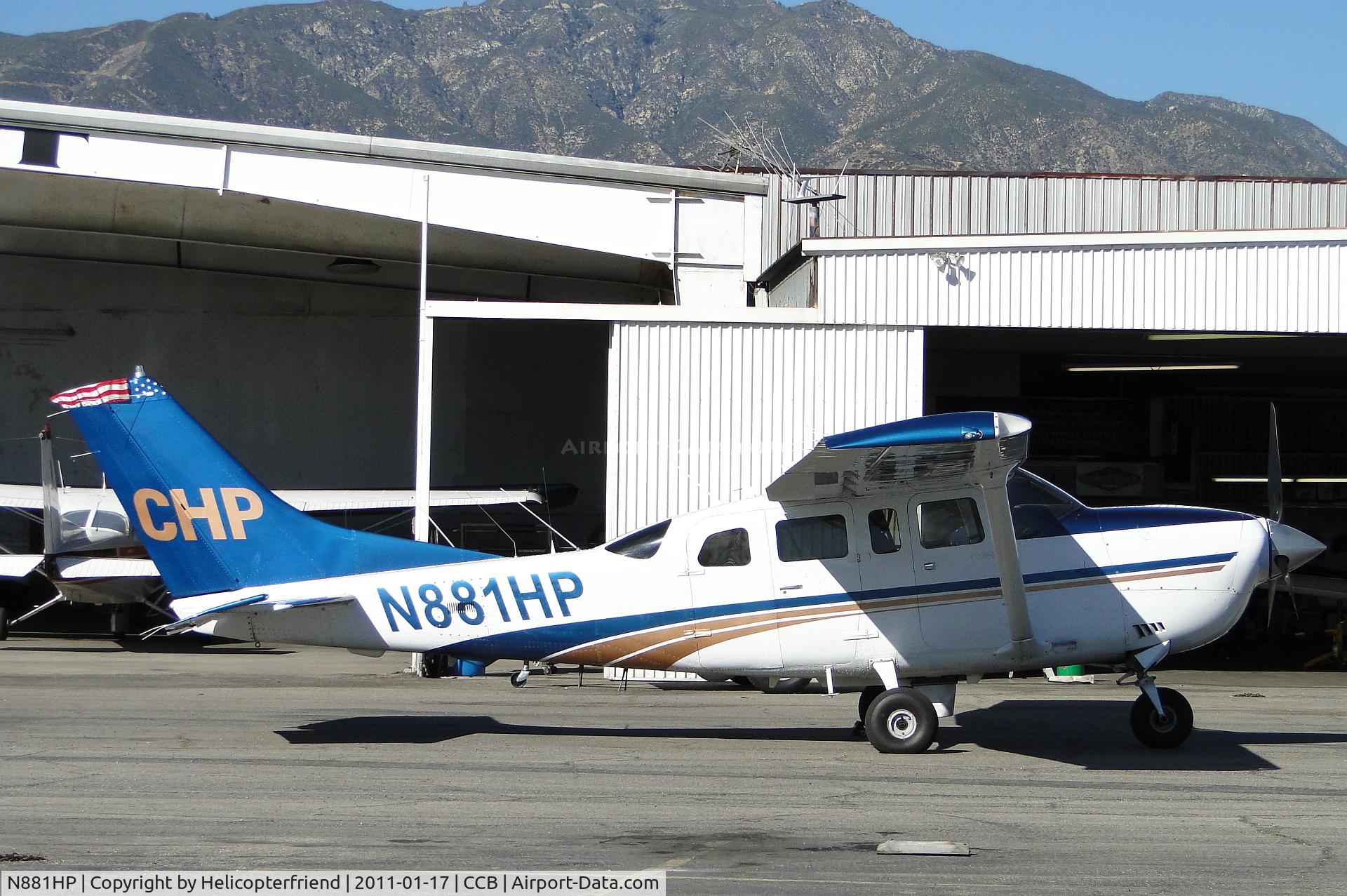 N881HP, 2000 Cessna T206H Turbo Stationair C/N T20608234, Parked at Foothill Sales & Service as N811HP Eurocopter arrives to pick up pilot, has new American flag on the top of the tail
