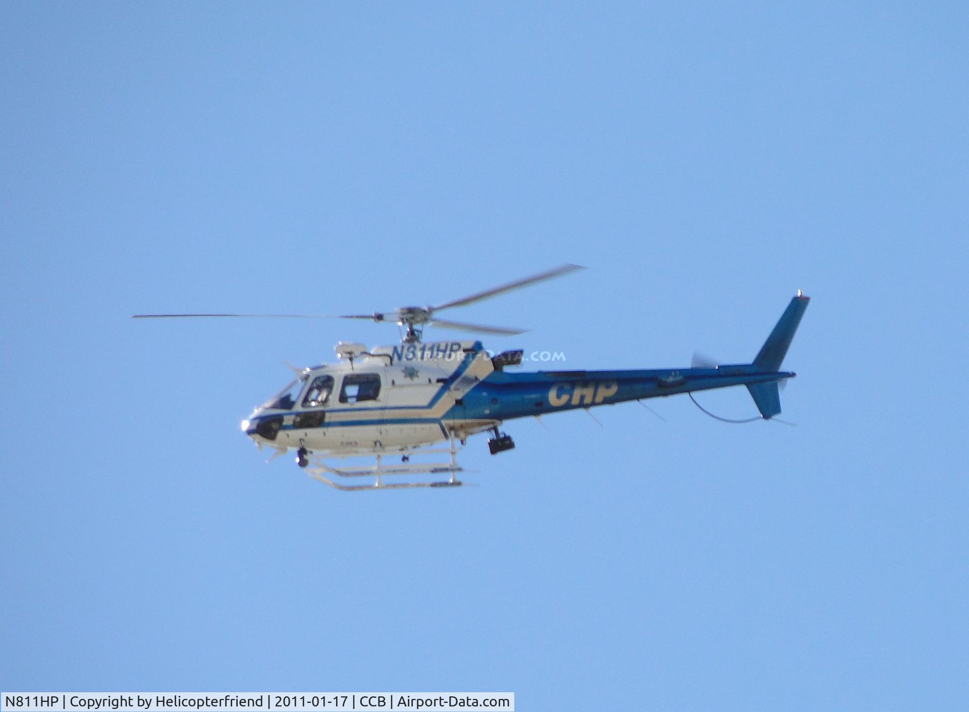 N811HP, 2001 Eurocopter AS-350B-3 Ecureuil Ecureuil C/N 3404, Crossing runway west of the airport before turning downwind enroute to eastside helipad