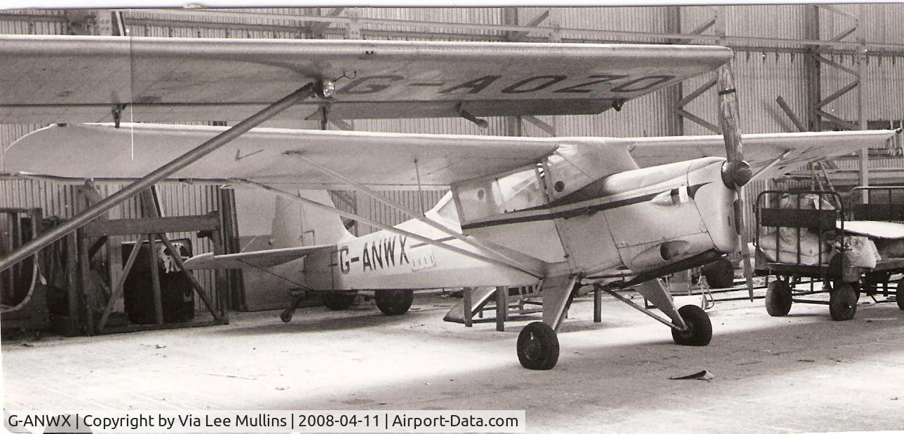 G-ANWX, 1954 Auster J-5L Aiglet Trainer C/N 3131, G-ANWX at Lymnpe, Kent in the 1950's when operated by Skyways Ltd as a photo ship to photograph vessels in the English Channel.