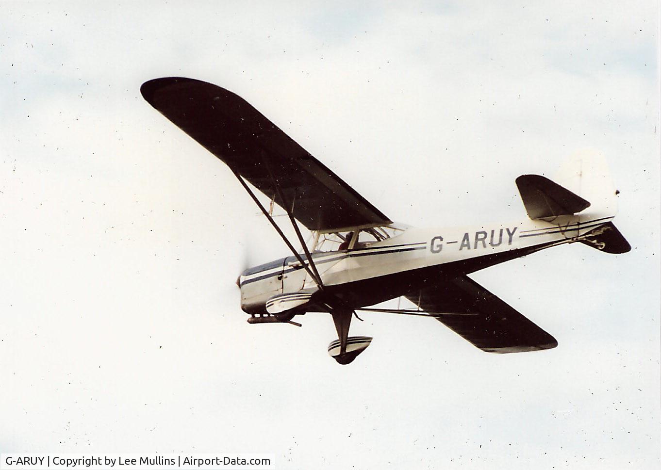 G-ARUY, 1962 Auster J-1N Alpha Alpha C/N 3394, G-ARUY taking off from Old Warden. This photo was tweaked, to give an Australian registration and the image superimposed over Ayres Rock. The resulting image was then used on advertising hoardings in Ireland to promote Fosters lager.