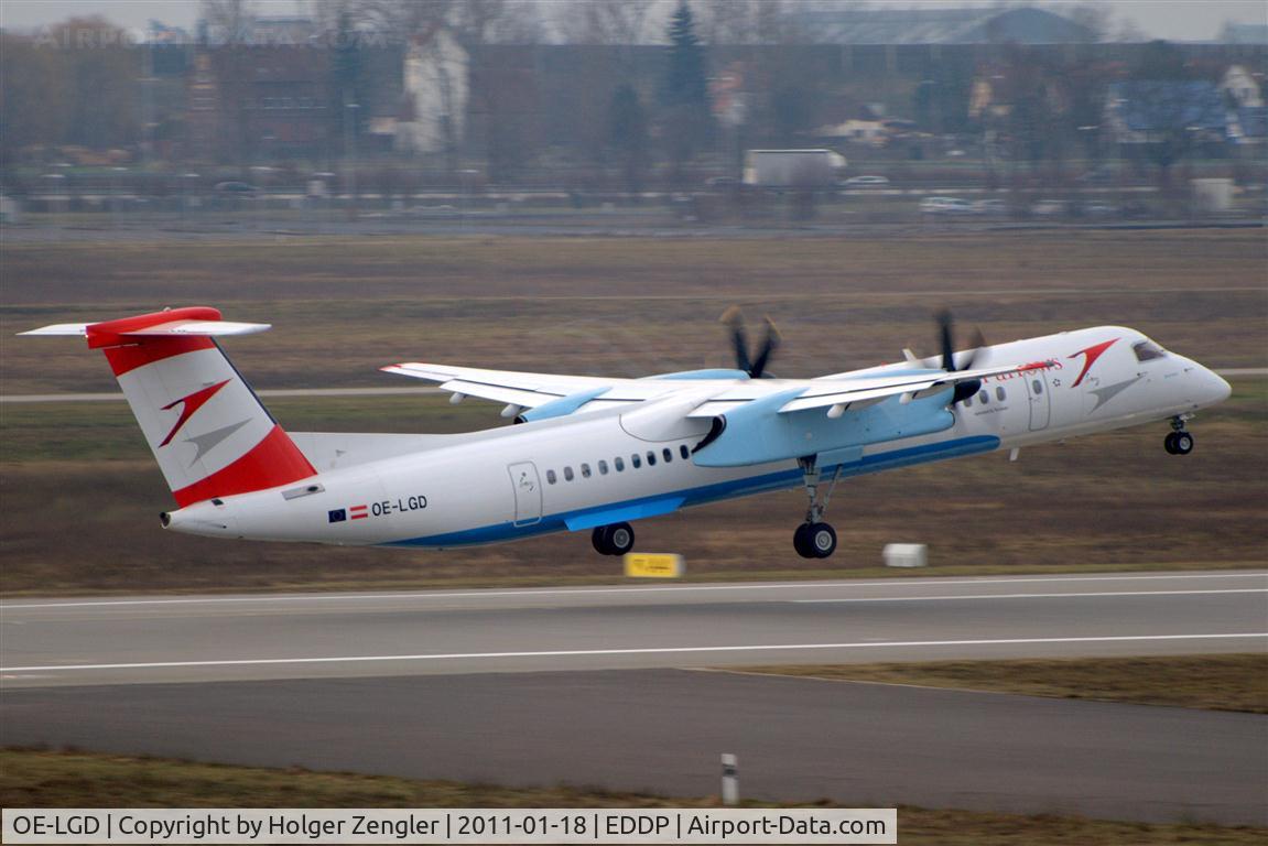 OE-LGD, 2000 De Havilland Canada DHC-8-402Q Dash 8 C/N 4027, Take off on rwy 26R.