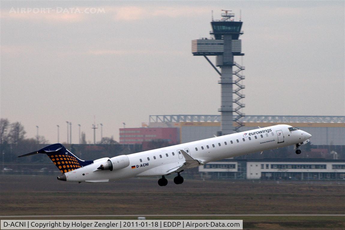 D-ACNI, 2009 Bombardier CRJ-900 NG (CL-600-2D24) C/N 15248, Passing Leipzig Tower on the way to DUS.