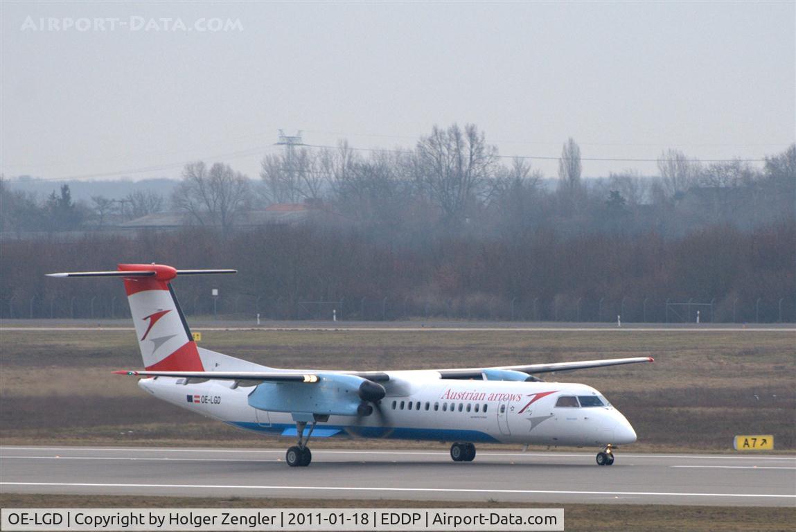OE-LGD, 2000 De Havilland Canada DHC-8-402Q Dash 8 C/N 4027, An arrow takes 26R for a jump to Vienna via Dresden.
