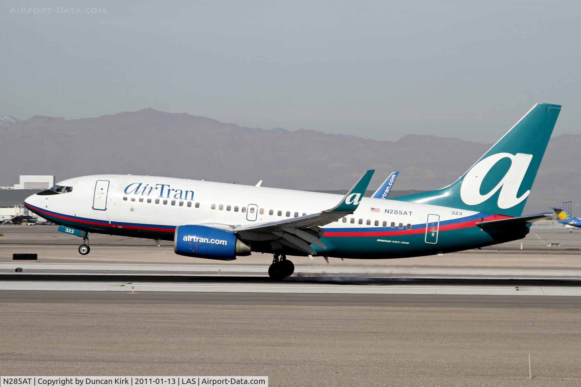 N285AT, 2006 Boeing 737-76N C/N 32670, The rubber smoke....the perfect shot!