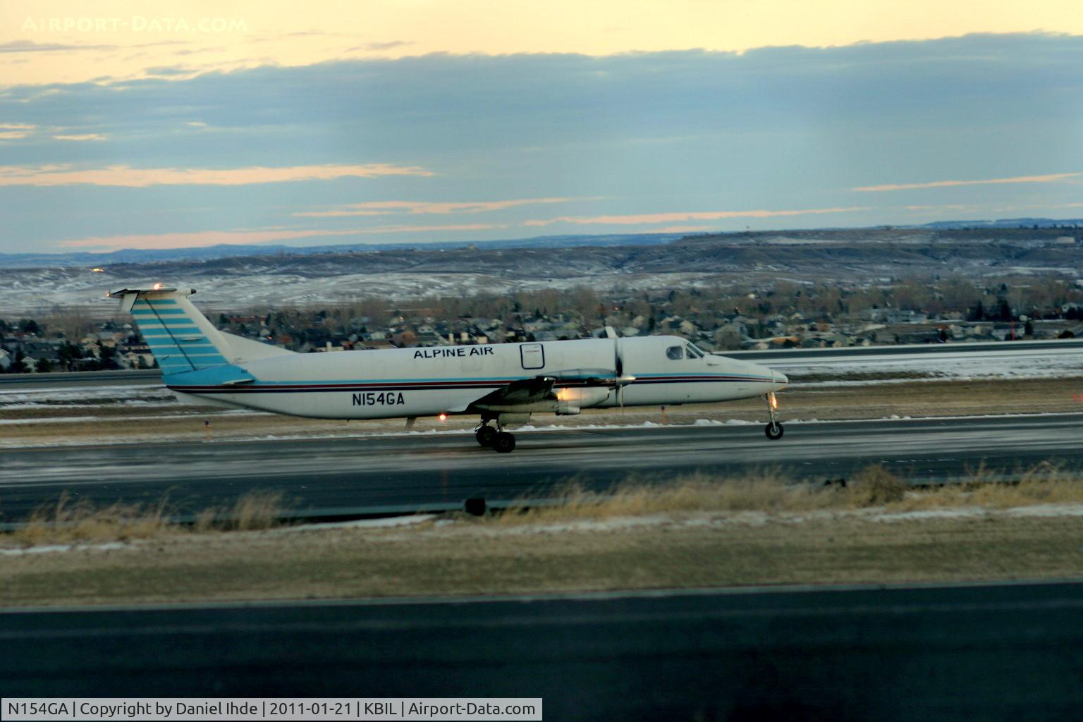 N154GA, 1984 Beech 1900C C/N UB-25, Alpine Air Beech 1900 departing Billings Logan 1-21-2011