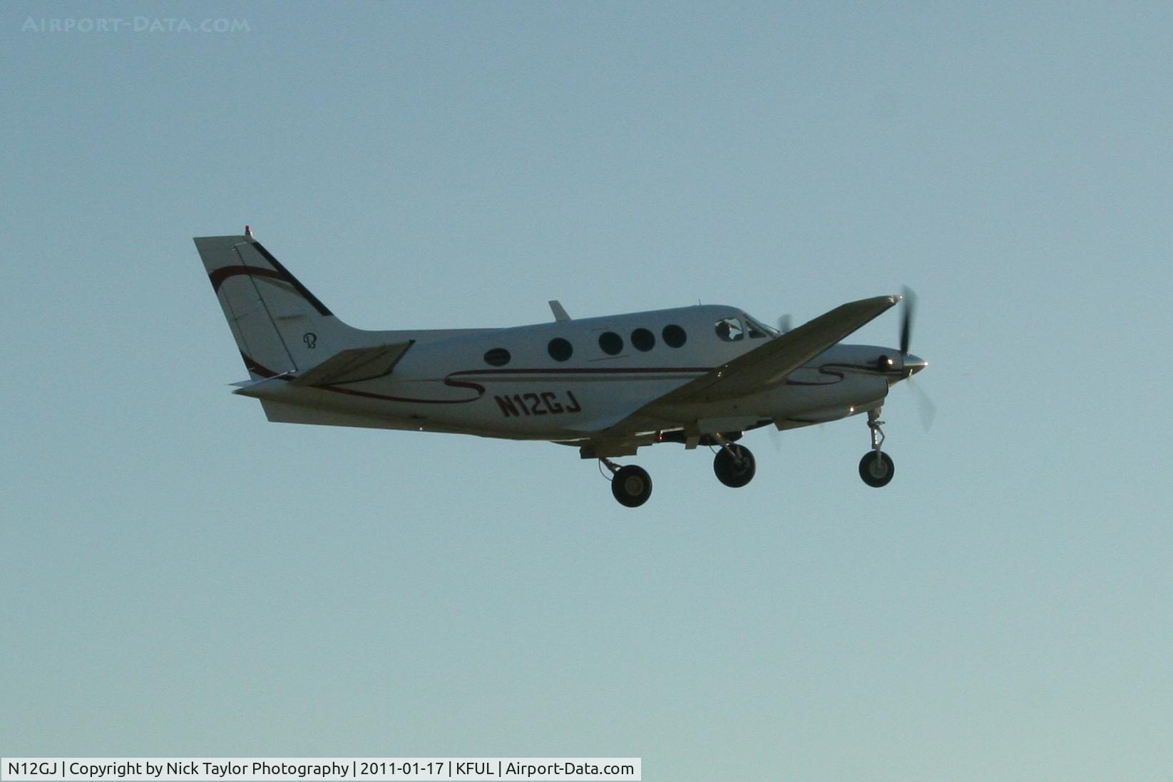 N12GJ, 1972 Beech E-90 King Air C/N LW-12, Departing FUL rwy 24