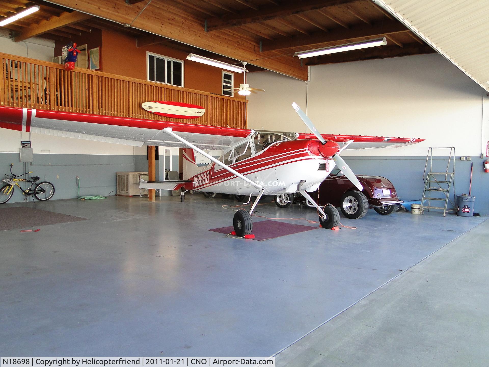 N18698, 1969 Cessna 180H Skywagon C/N 18052076, N275JS's roomate along with the hotrod on the side