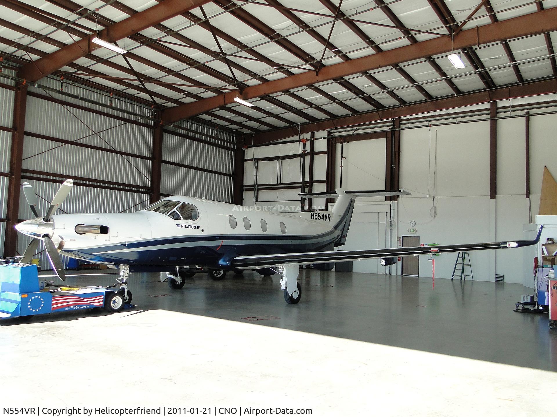 N554VR, 1999 Pilatus PC-12/45 C/N 288, Has tug hooked up, unknown if coming out or going in