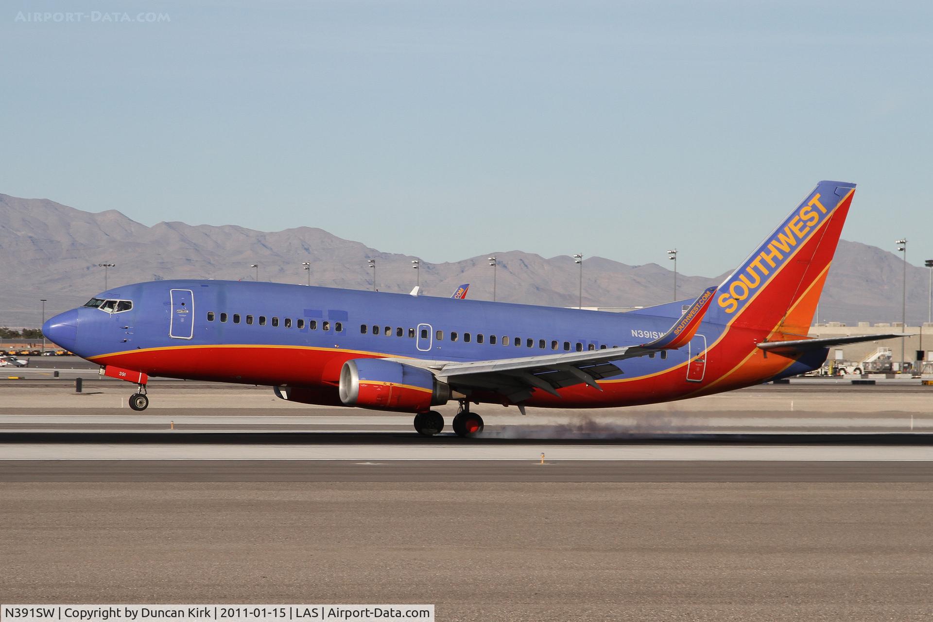 N391SW, 1994 Boeing 737-3H4 C/N 27378, Just touching down