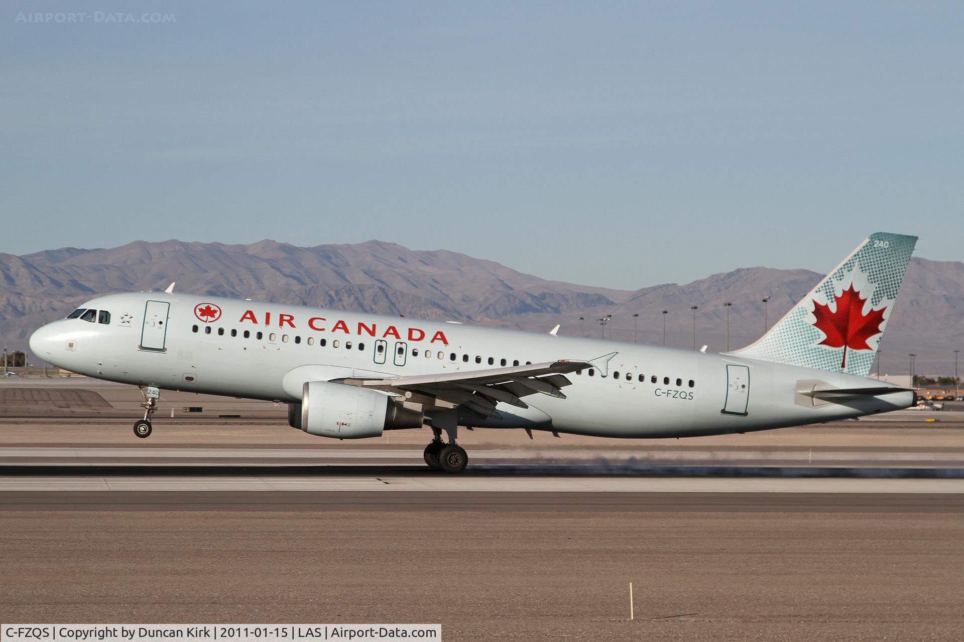 C-FZQS, 2003 Airbus A320-214 C/N 2145, Late afternoon lander at LAS