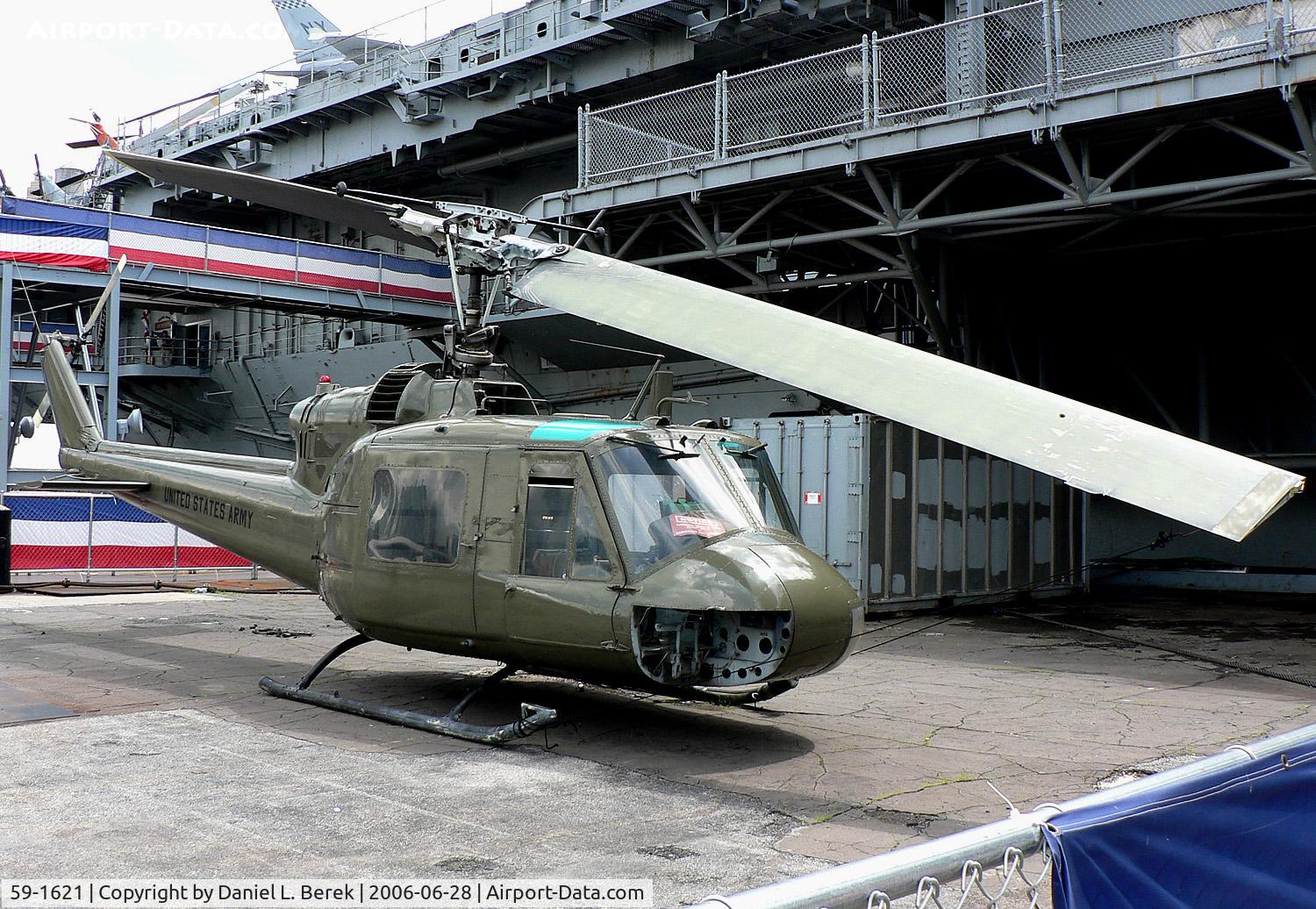 59-1621, 1959 Bell UH-1A Iroquois C/N 80, When I photographed this aircraft in 2006, she bore the fictitious number 30257.  She has since been relocated to the flight deck of the carrier.
