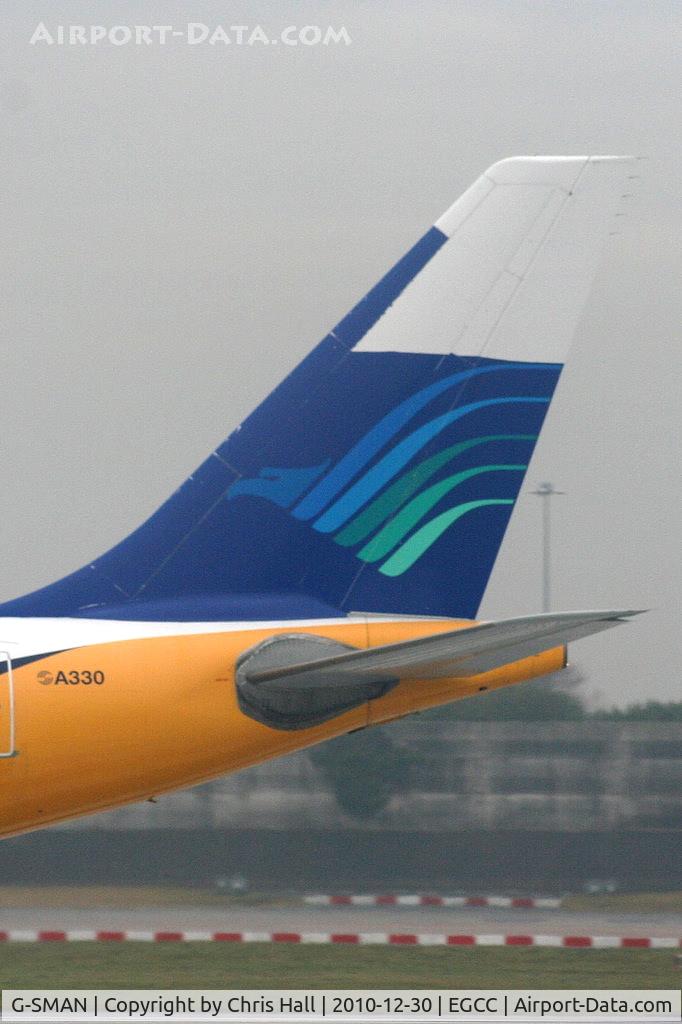 G-SMAN, 1999 Airbus A330-243 C/N 261, still wearing Garuda Indonesia colours on the tail after returning from lease