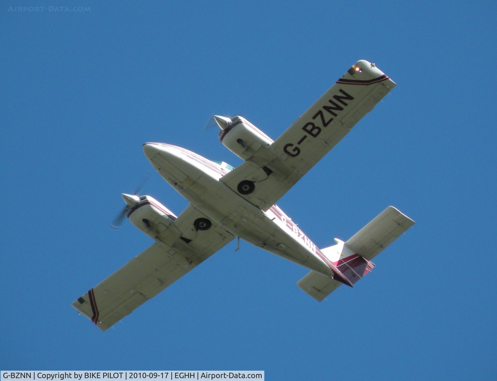 G-BZNN, 1980 Beech 76 Duchess C/N ME-343, Duchess in the overhead